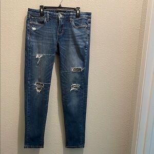 White House Black Market Blue Skinny Jeans with Modern Distressing